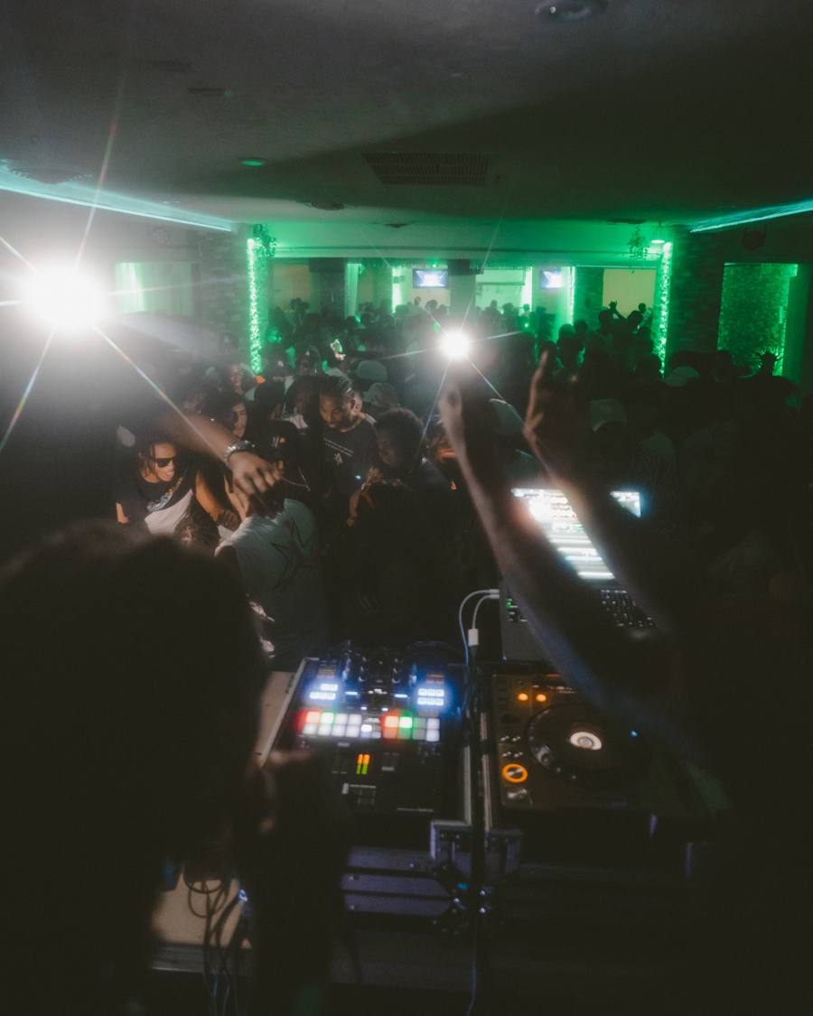 DJ over a lit crowd